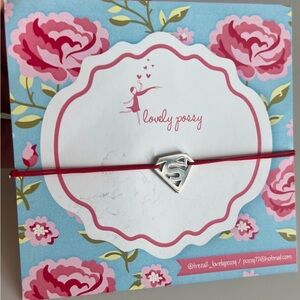 Superman logo sterling silver bracelet with red adjustable thread